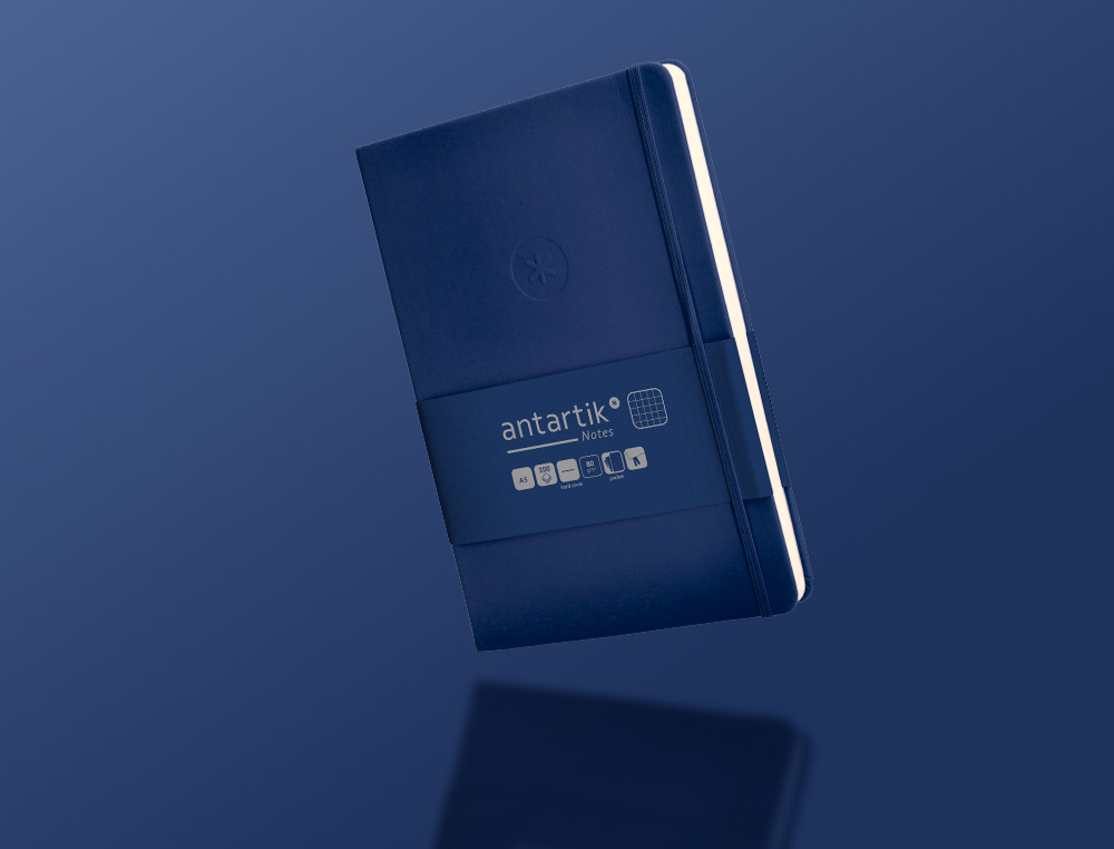 CADERNO COM ELASTICO ANTARTIK NOTES CAPA DURA A5 QUADRICULADO AZUL MARINHO 100 FOLHAS 80 GR FSC