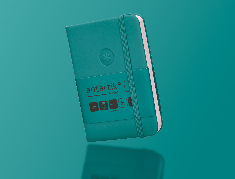 CADERNO COM ELASTICO ANTARTIK NOTES CAPA DURA A7 LISO VERDE AGUA-MARINHA 80 FOLHAS 80 GR FSC