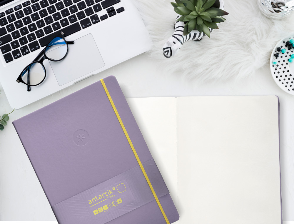 CADERNO COM ELASTICO ANTARTIK NOTES CAPA DURA A4 LISO ROXO E AMARELO 100 FOLHAS 80 GR FSC