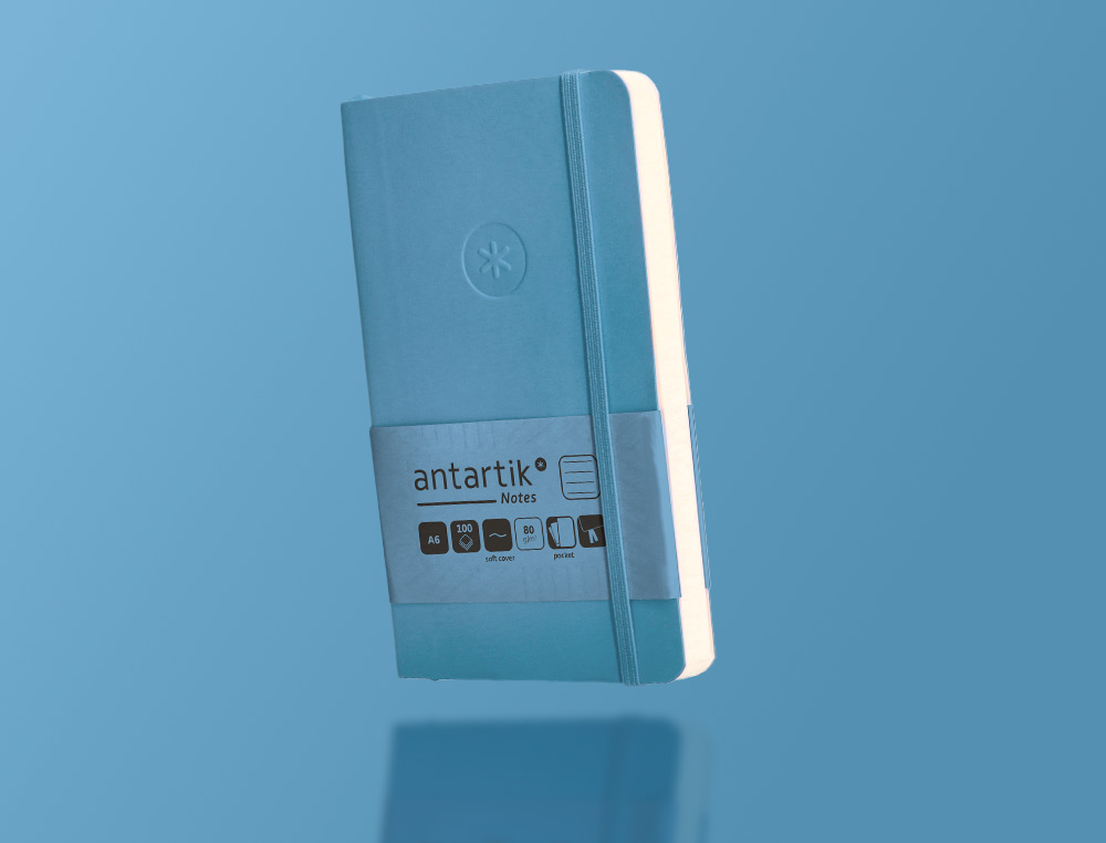 CADERNO COM ELASTICO ANTARTIK NOTES CAPA MOLE A6 PAUTADO AZUL CLARO 100 FOLHAS 80 GR FSC