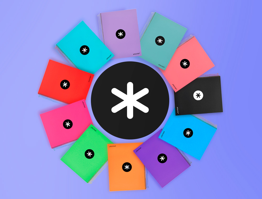 CADERNO ESPIRAL DIN A4 ANTARTIK CAPA FORRADA 120 F 100 GR PAUTADO 5 BANDAS DE CORES 4 FUROS CORES SORTIDAS